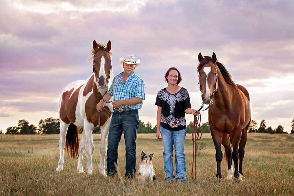 Couple with quarter horses