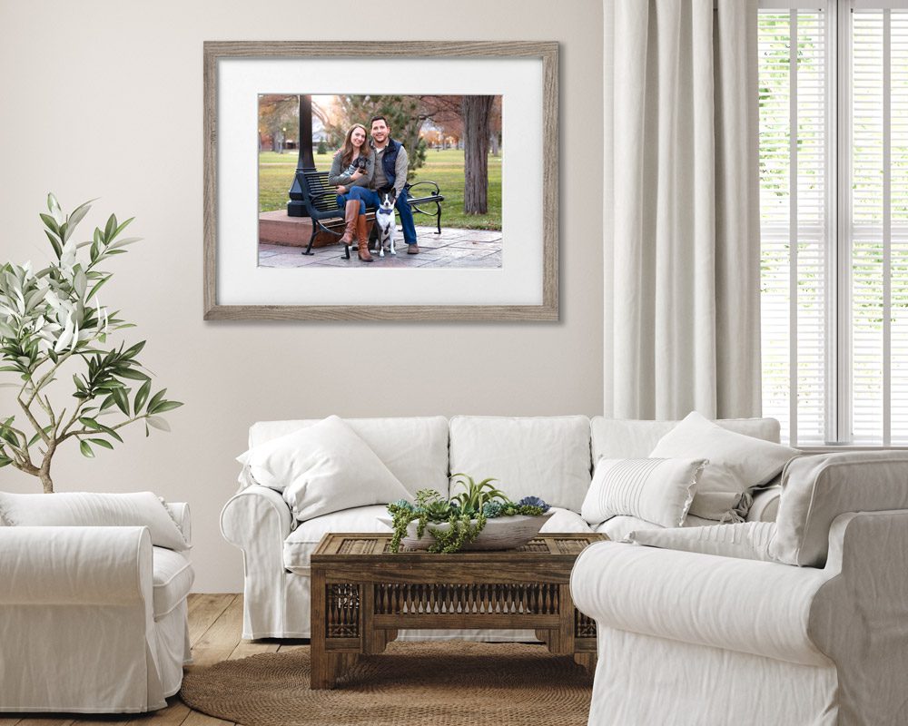 Living room portrait of couple and dogs